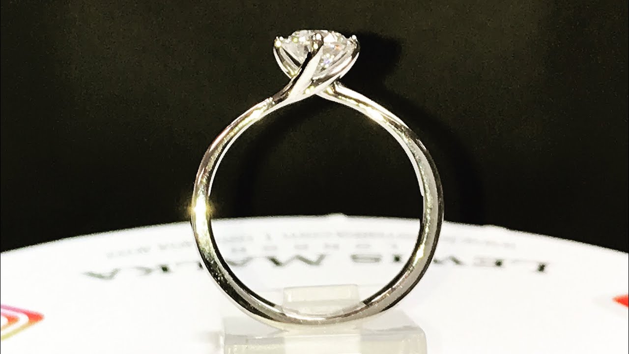 The four-claw twist engagement ring - Jessica ring