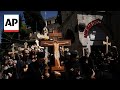 Orthodox Christian pilgrims mark Good Friday in the Old City of Jerusalem