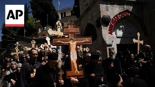 Orthodox Christian pilgrims mark Good Friday in the Old City of Jerusalem