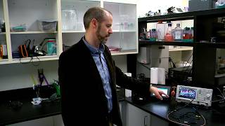 Associate professor Nigel Reuel working in his laboratory at the ISU research park