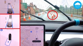 FSD navigates cone MAZE in heavy rain & puddles! | Tesla 2020.20.12 Wet City & Construction Test