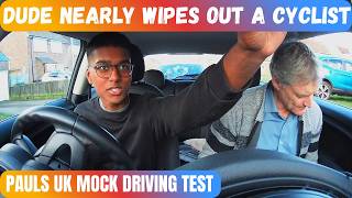 Learner driver Paul nearly wipes out a cyclist during his UK mock test.