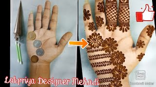 Very simple or beautiful mehndi design with coins and cotton buds.