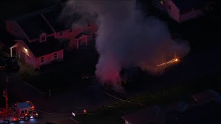 Flames engulf garbage truck in Mountainside residential neighborhood