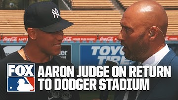 Aaron Judge talks with Derek Jeter & 