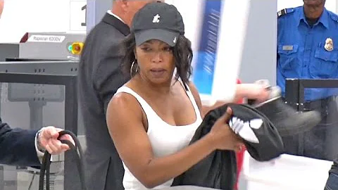 Angela Bassett Shows Of Her Biceps Going Through L...