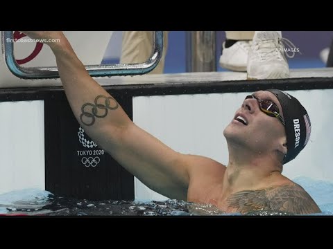 Caeleb Dressel wins first individual gold medal in men's 100m freestyle, sets Olympic record