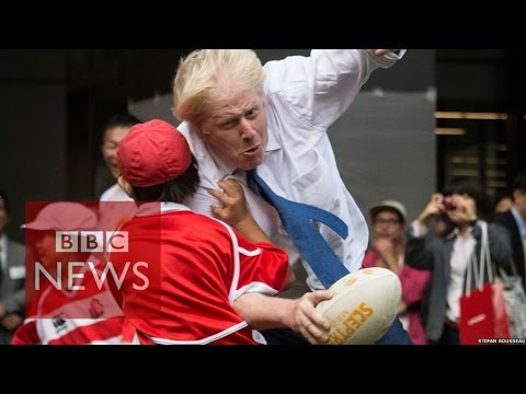 Boris Johnson takes out boy in rugby - BBC News