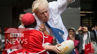 Boris Johnson takes out boy in rugby  BBC News