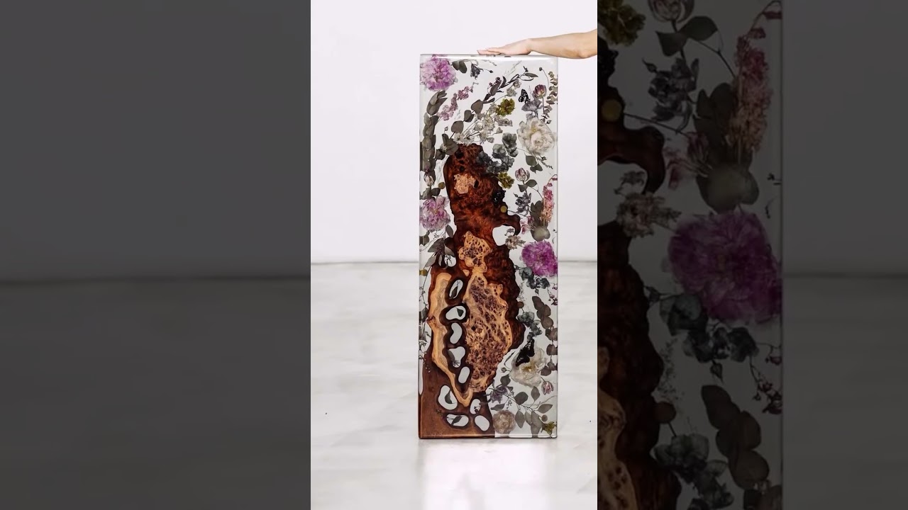 "Into the Water: A Resin Table with Holes Like Nature's Secret Pools"