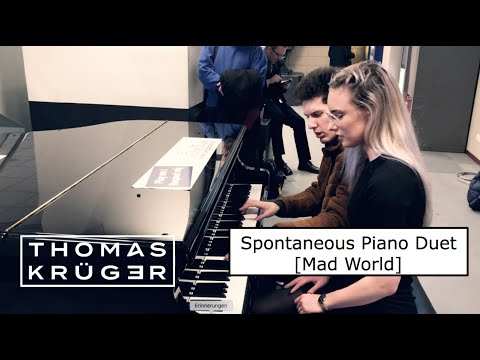 spontaneous-piano-duet-[mad-world]-at-station-amsterdam-centraal-–-thomas-krÜger