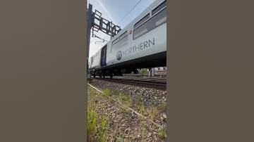 Northern Rail Class 319 passing through the Station