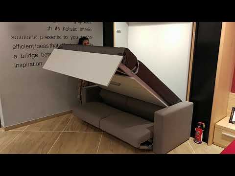 Wideo: Co to jest rozkładana sofa rozkładana na ścianę?