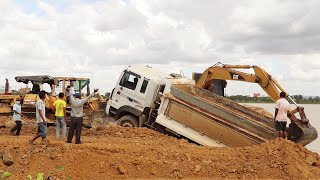Great Recovery Dump Truck Unloading Fails Stuck in Deep Mud by Cat Excavator and Komatsu Bulldozer