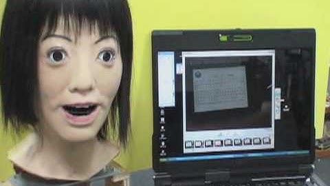 Singing robotic head reads music