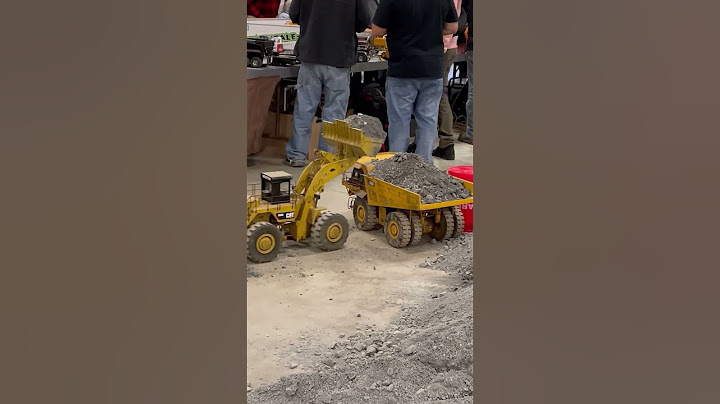 RC construction | Cat loader and dump truck at Cabin Fever Expo