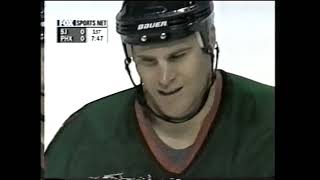 The linesmen break up Ronnie Stern and Louie DeBrusk - Dec 19, 1999