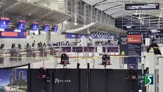 Car crashes into gates of Detroit Metro Airport