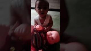 Kenisha Playing With Her Doll.