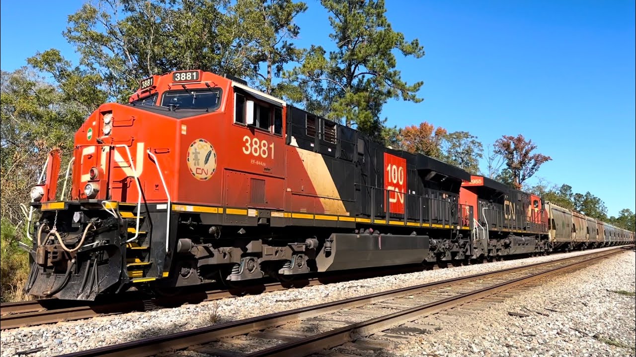 CN ES44AC 3881 100th Anniversary Unit Leads CSX B241-08 at Dahoma, FL