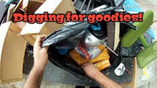 Rummaging through trash piles for scrap metal.
