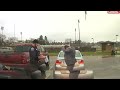 Dashcam: Police Officer Helps Speeding Student Tie His Tie