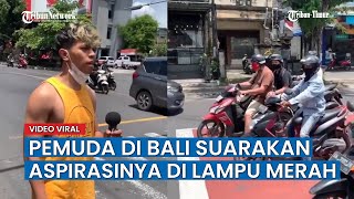 Viral Di Sosmed Aksi Seorang Pemuda Di Bali Suarakan Aspirasi Di Lampu Merah