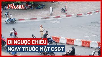 Nhiều xe máy thản nhiên đi ngược chiều tại nút giao thông 