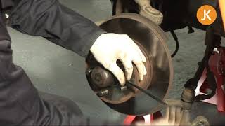 How to remove and replace the front brake caliper and brake disc on a VW T2 Bay