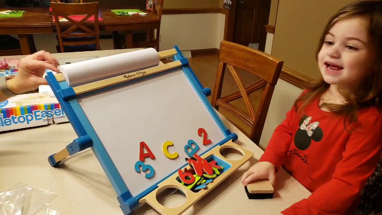 Opening and Playing with the Melissa & Doug Deluxe Double-Sided Tabletop  Easel