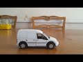 Stop motion ford transit connect driving by on the road robinbeare