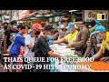 Jobless Thais queue for food as economy worsens amid the  coronavirus pandemic