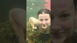 Mermaid Swimming In The Mangroves In The Florida Keys
