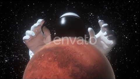 An Astronaut Stretches His Hands Behind the Planet Mars | Motion Graphics - Envato elements