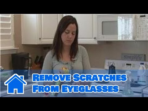 How can you remove scratches from eyeglasses?