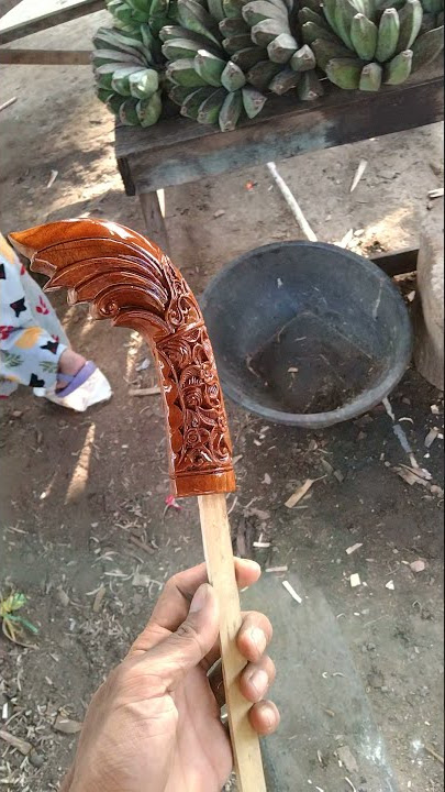 contoh hulu parang Lais ukiran daun dan bunga