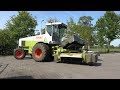 Gras maaien met Claas Jaguar 690 SL en schudden met John Deere 6910 + Kuhn schudder (2019)