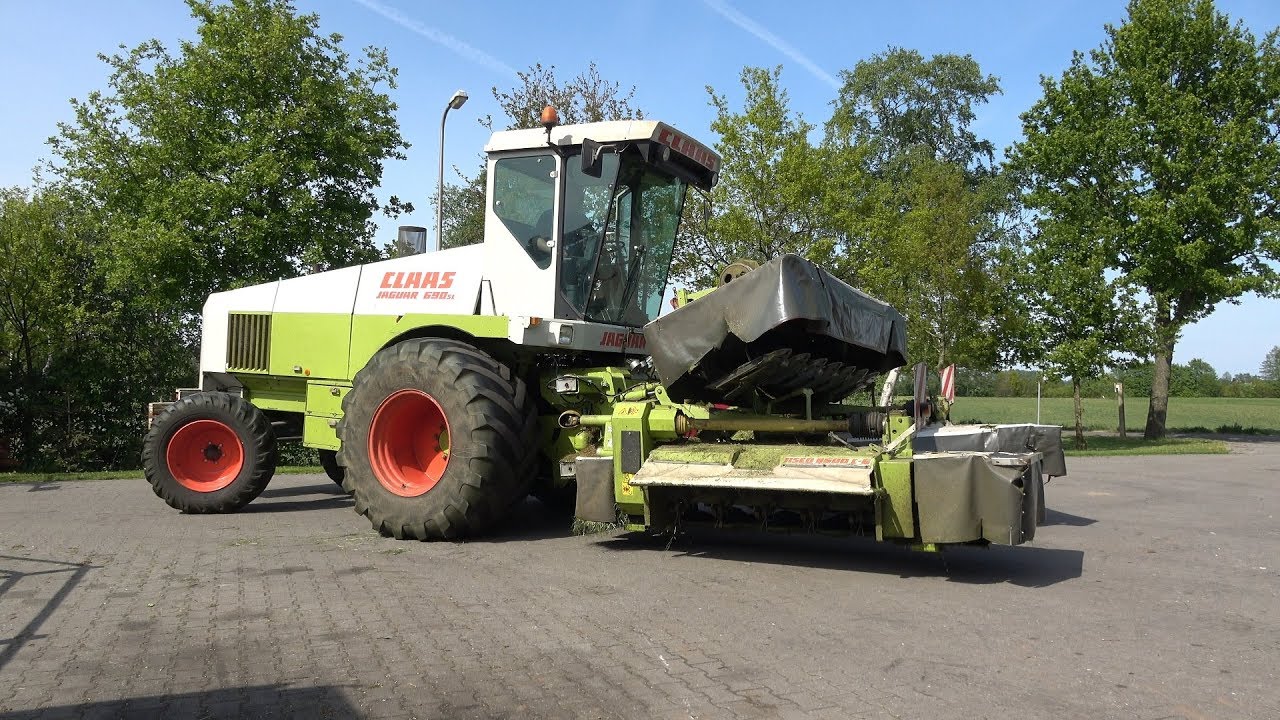 Gras maaien met Claas Jaguar 690 SL en schudden met John Deere 6910 + Kuhn schudder (2019)