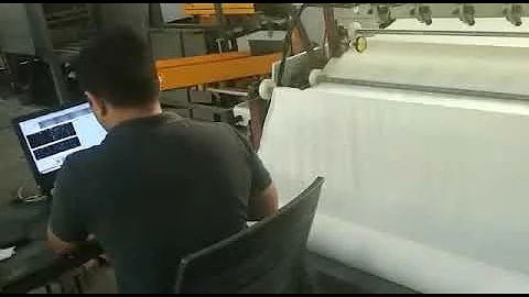 Gridbots Fabricheck - AI based Automatic Fabric Inspection system