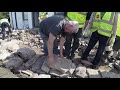 Building dry stone walls. Clare island, Co. Mayo