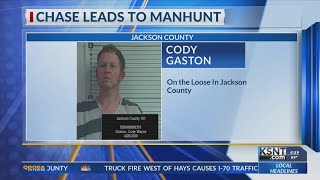 Passenger in custody, manhunt underway for driver after chase in Jackson County