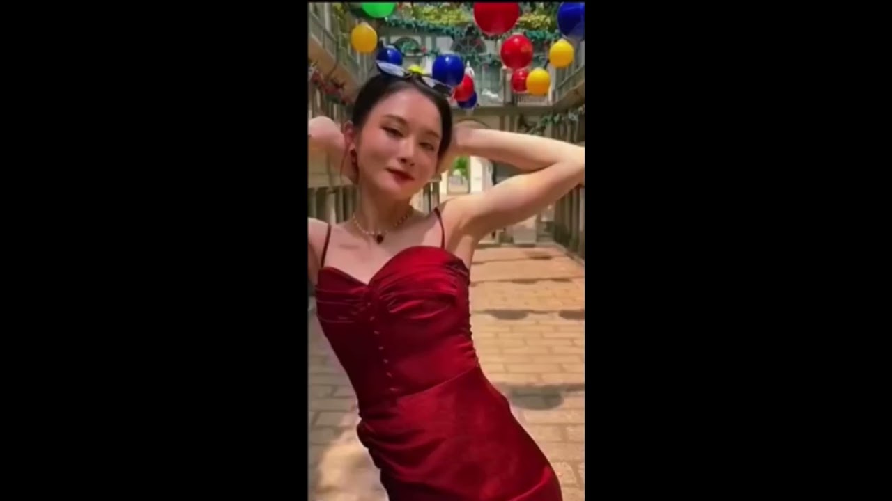 Woman In Red Dress Dodging Stick Bat