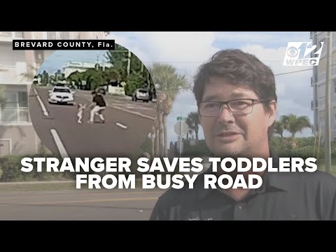 Good Samaritan halts traffic to save toddlers on busy road, dashcam captures rescue