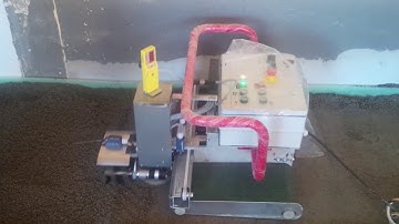Floor screeding - automatic laser level machine at work
