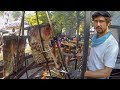 Argentina Street Food. Huge Load of Asado and Mixed Meat on Grill
