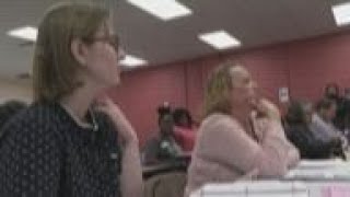 Swing state poll workers train for conflict
