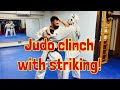 Judo clinch with striking to set up throws