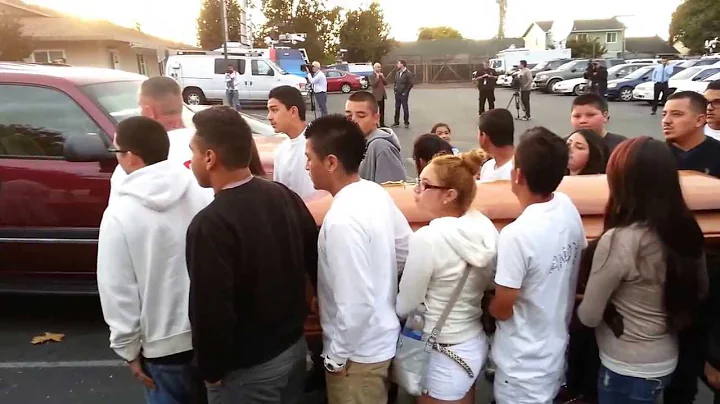 Andy Lopez being carried into the funeral mass