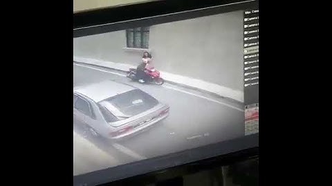 Cướp manh động quá cướp giật túi xách