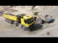 Mercedes Arocs and Volvo 150 loader